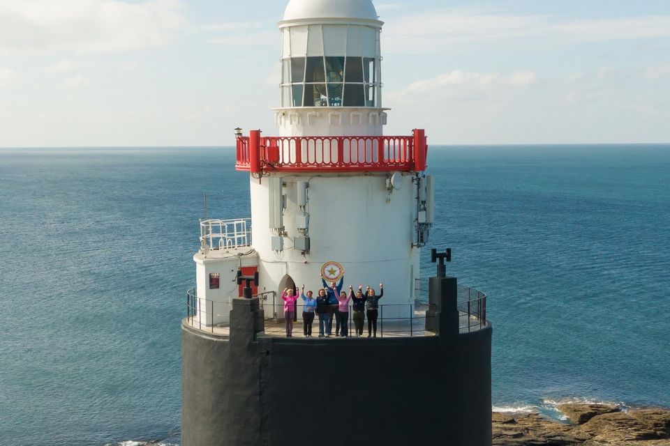 Tom, Laura and the team at the top of Hook Lighthouse.