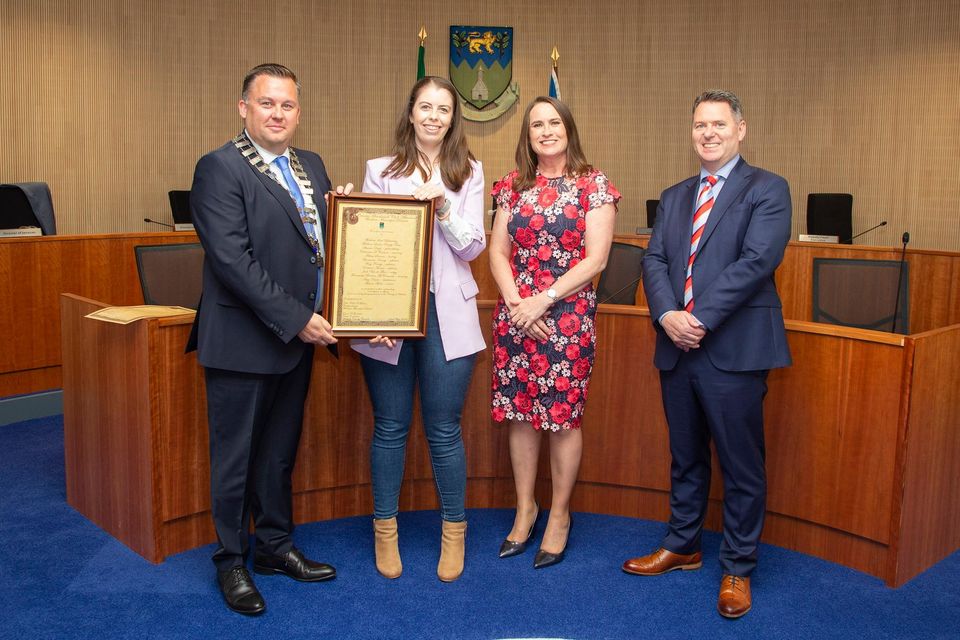 Cathaoirleach of the Wicklow Municipal District Paul O'Brien, CEO of Wicklow County Council Emer O' Gorman and Brian Gleeson present Amy Davis with the Cathaoirleach's Achievements and Contributions to Sport Award at a Civic Reception in Council Buildings, Wicklow town.