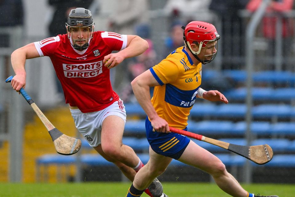 Pádraig Power of Cork goes past Paul Flanagan of Clare on his way to scoring a goal, in the 9th minute, during the Allianz Hurling League Division 1 Group A match between Clare and Cork at Cusack Park in Ennis Photo by Ray McManus/Sportsfile