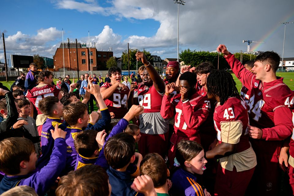 23 August 2024; Players from Florida State engage in a sing-song after a football clinic at Kilmacud Crokes GAA Club in Dublin, ahead of the 2024 Aer Lingus College Football Classic match between Florida State and Georgia Tech at the Aviva Stadium this Saturday. Photo by Brendan Moran/Sportsfile 