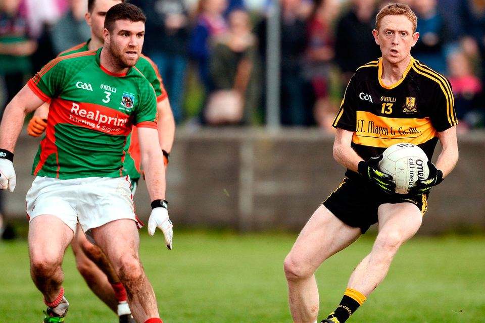Colm Cooper of Dr Crokes in action against Darren Hickey of Kilmurry Ibrickane