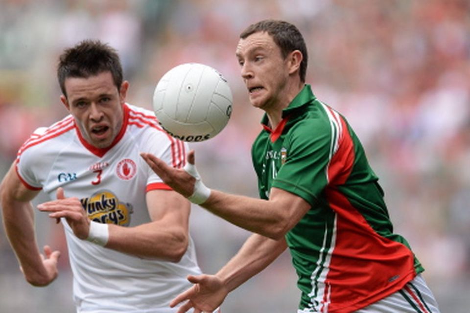 Mayo's Keith Higgins in action against Conor Clarke