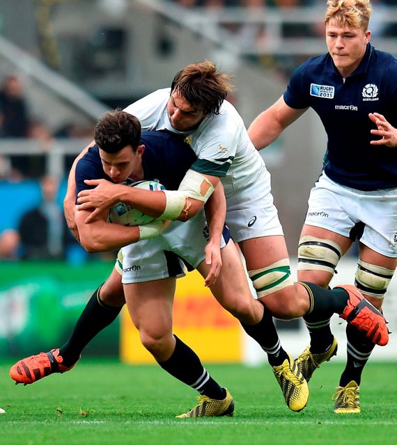 Scotland's Matt Scott (left) is tackled by South Africa's Lodewyk De Jager during the World Cup match at St James' Park, Newcastle. PRESS ASSOCIATION Photo. Picture date: Saturday October 3, 2015. See PA story RUGBYU South Africa. Photo credit should read: Owen Humphreys/PA Wire. RESTRICTIONS: Use subject to restrictions. Editorial use only. No commercial use. No use in books or print sales without prior permission. Call +44 (0)1158 447447 for further information.