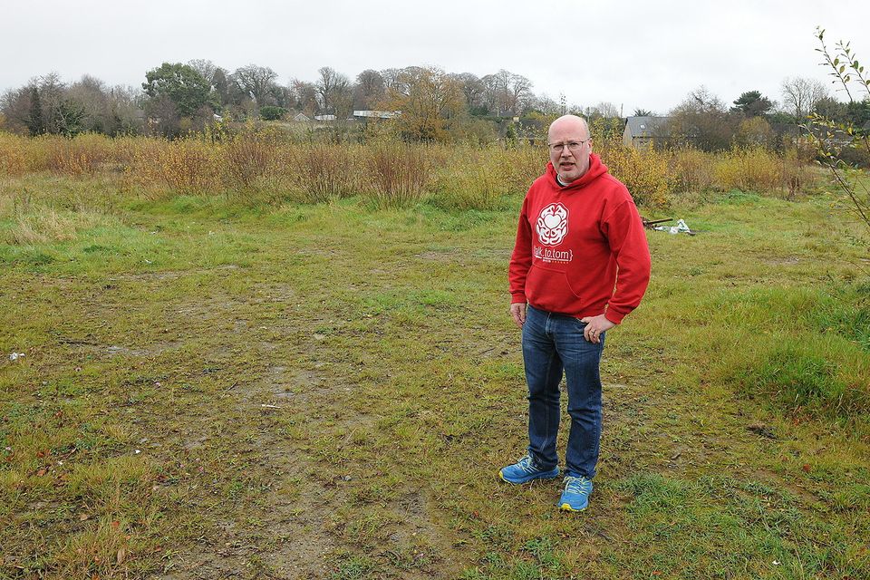 Cllr Fionntán Ó Suilleabháin pictured on the site in Ramsfort, Gorey where the affordable housing scheme will be going ahead. Pic: Jim Campbell