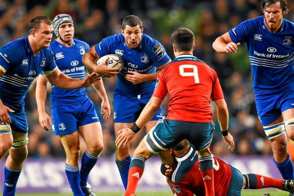 Leinster's Rob Kearney is tackled by BJ Botha as he runs at Munster scrum-half Conor Murphy during the Guinness Pro12 clash at the Aviva. Photo: Stephen McCarthy / SPORTSFILE