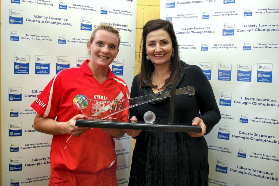 Cork's Briege Corkery is presented with the player of the match award by Annette N' Dhathalao' of Liberty Insurance
