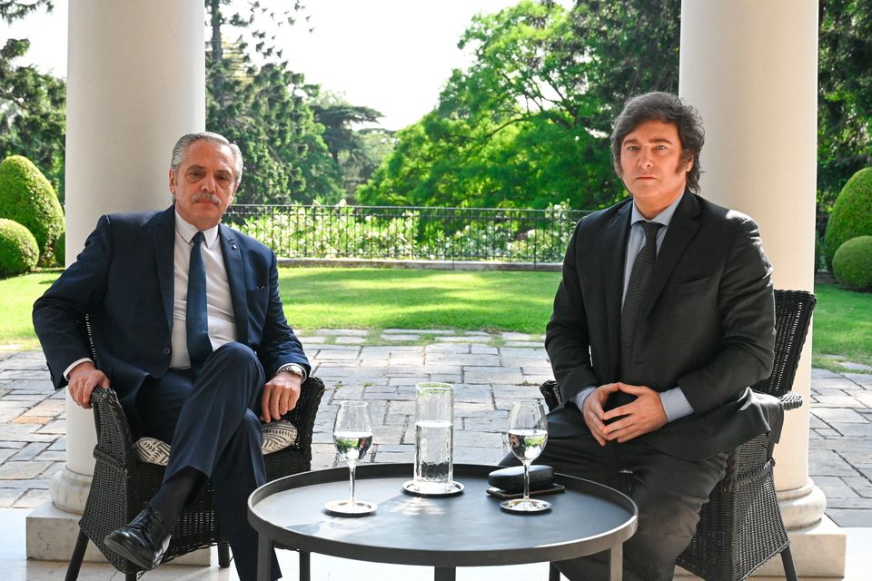 President of Argentina Alberto Fernandez and president-elect Javier Milei pose during a meeting in Olivos, Buenos Aires, yesterday. Photo: via Getty Images