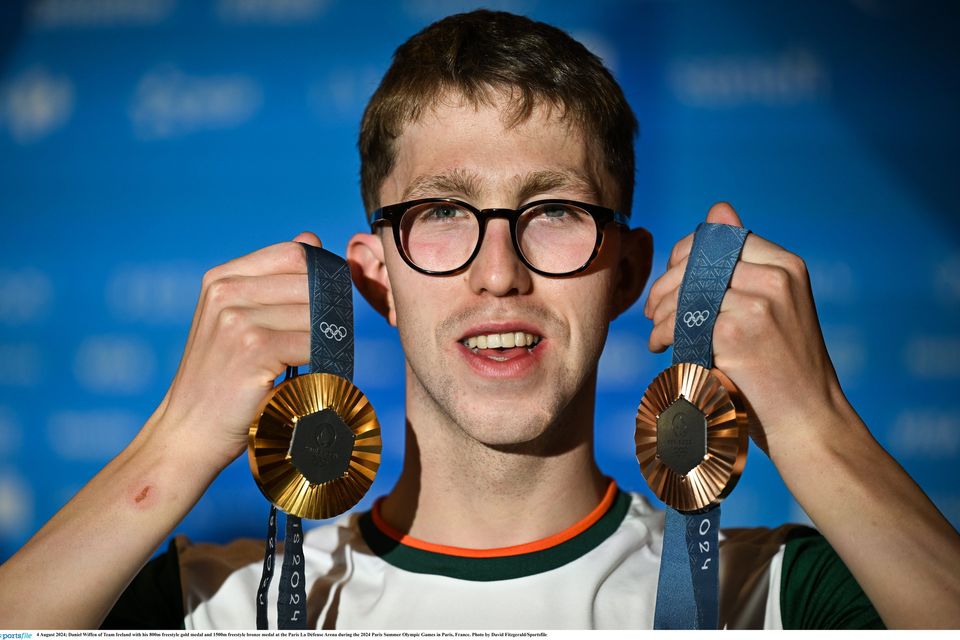 Daniel Wiffen of Team Ireland with his 800m freestyle gold medal and 1,500m freestyle bronze medal at the Paris La Défense Arena during the 2024 Paris Summer Olympic Games. Photo: David Fitzgerald/Sportsfile