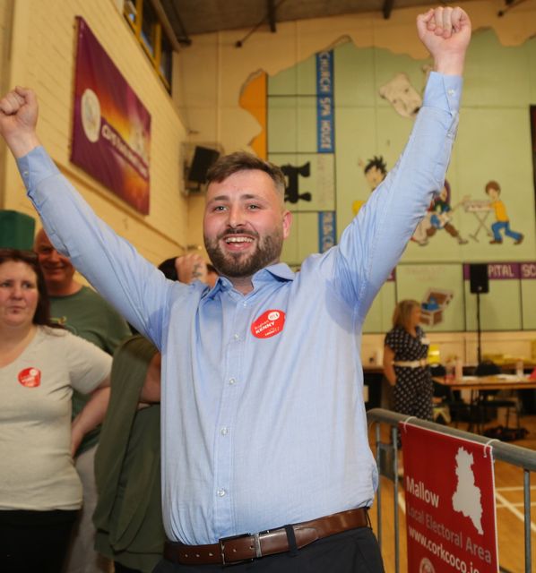 24-year-old Eoghan Kenny (Labour Party) celebrates his election to Mallow LEA.