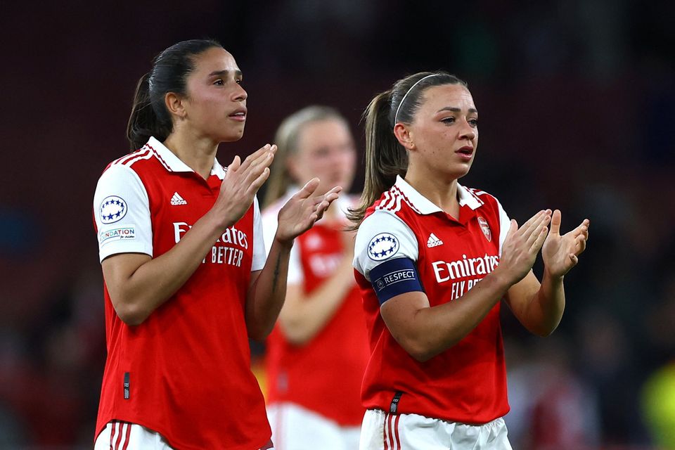Arsenal's Rafaelle and Katie McCabe applaud fans after the match at the Emirates