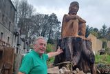 thumbnail: Mullichain cafe and restaurant co-owner, Martin O'Brien with the 'Mad Sweeney' wooden sculpture outside the premises in St Mullins, Co Carlow. 