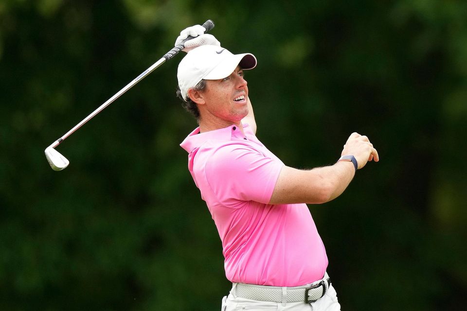 Rory McIlroy makes an approach shot on the sixth hole during the final round of the Canadian Open in Toronto