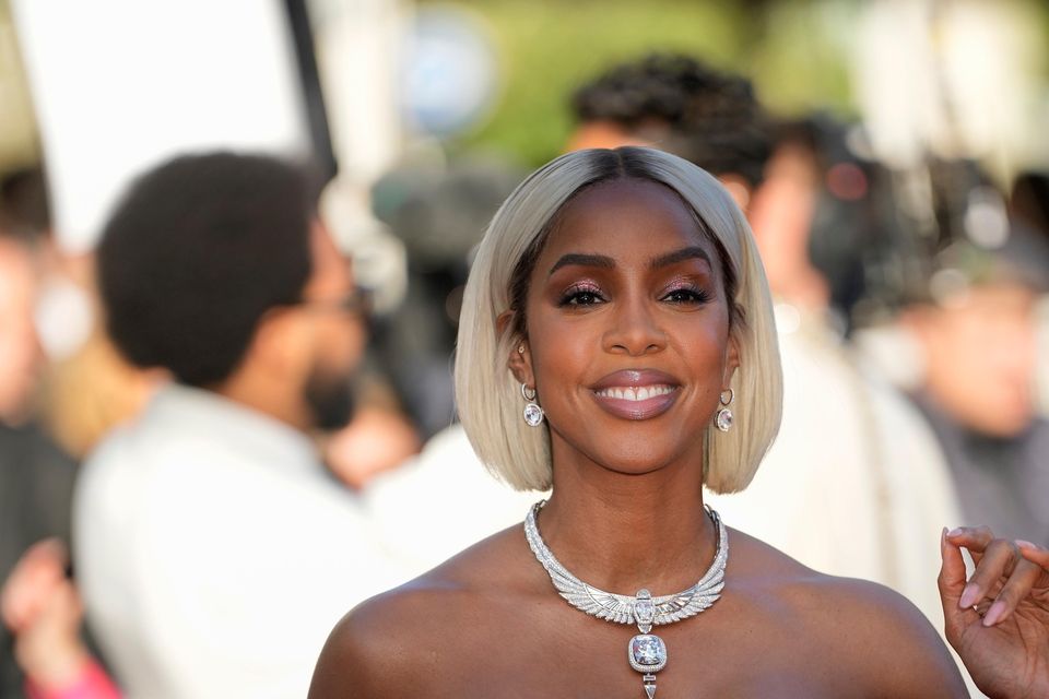 Kelly Rowland poses for photographers upon arrival at the premiere of the film Marcello Mio at the 77th international film festival in Cannes (Andreea Alexandru/Invision/AP)
