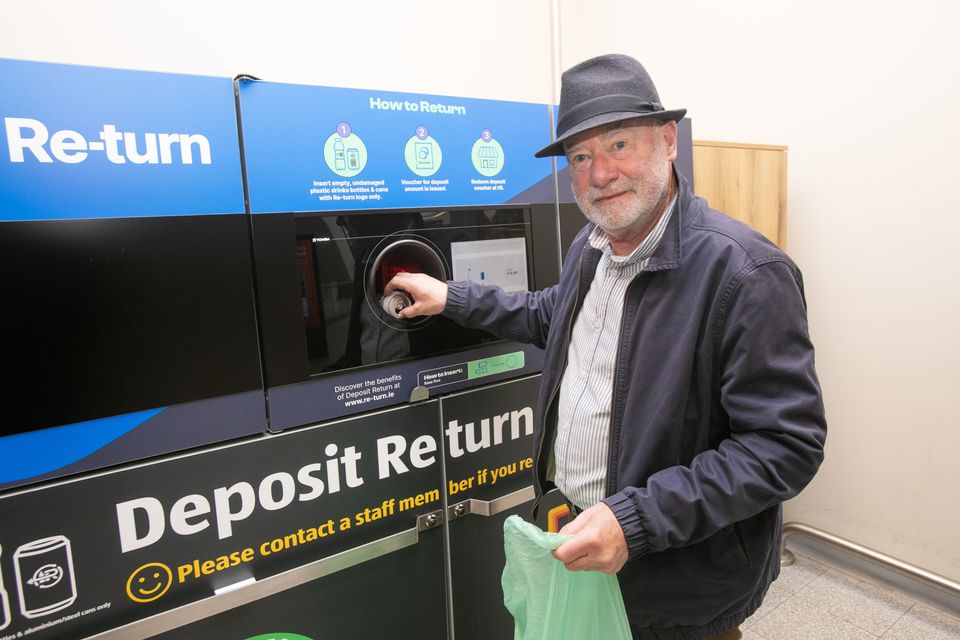 Liam Collins visits the Deposit Return Scheme point at his local supermarket. Photo: Gareth Chaney