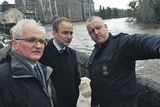 thumbnail: Environment Minister John Gormley (left) Foreign Affairs Minister Micheal Martin and Chief Fire Officer John Reyn (right) assess flood
damage at the Mercy University Hospital, Cork, where the River Lee burst its banks and collapsed a wall
