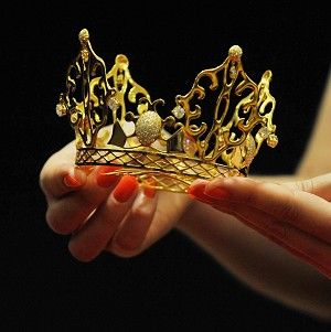The gold and diamond East of Paris tiara was worn by Victoria Beckham