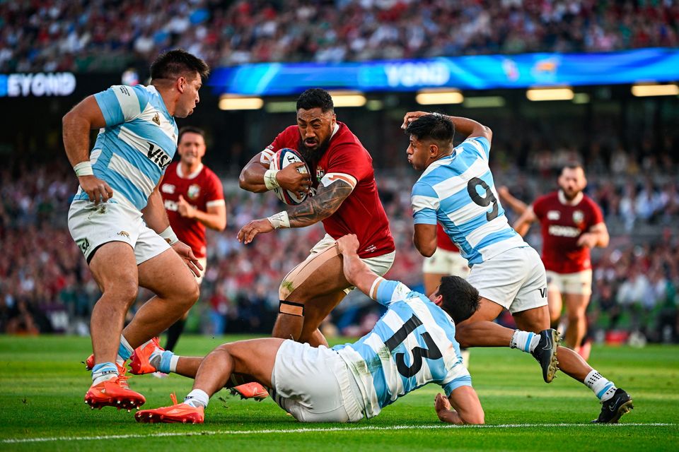Bundee Aki of British & Irish Lions in action against Argentina players, from left, Justo Piccardo, Lucio Cinti and Gonzalo García on his way to scoring his side's first try. Photo by Seb Daly/Sportsfile