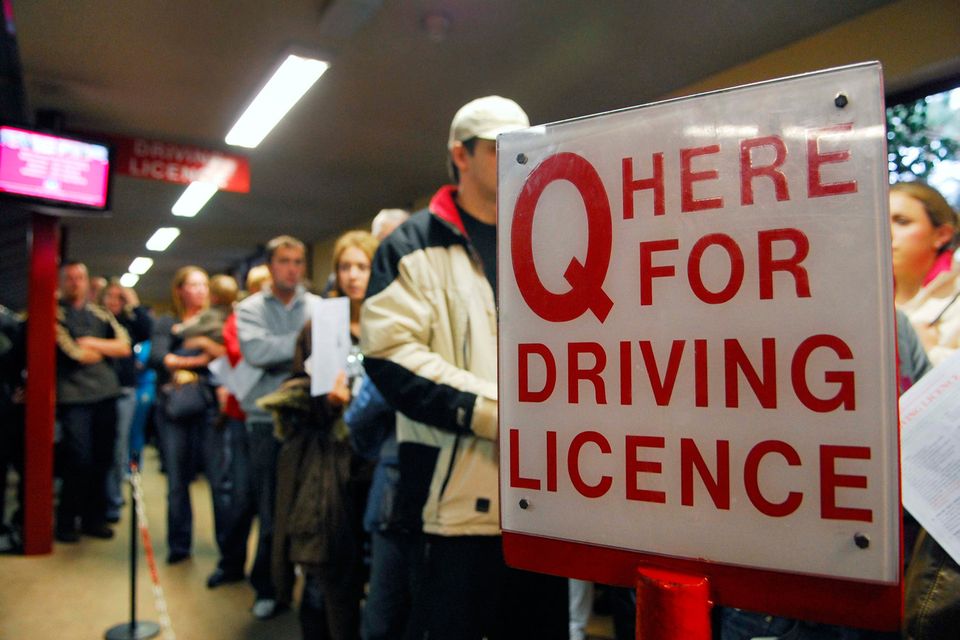 LINING UP: Learner drivers queue for their driving test applications in Cork County Hall. Picture: Provision