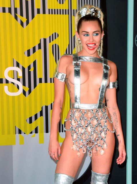 Miley Cyrus arrives on the red carpet at the MTV Video Music Awards