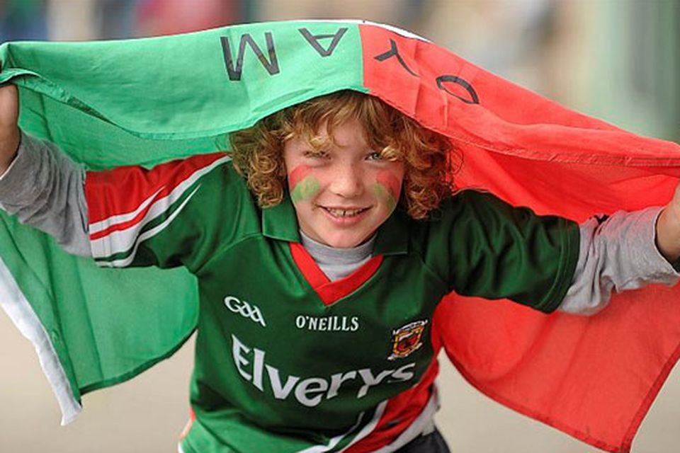 Mayo supporter Cian Degrieck, aged 7, from Crossmolina, Co. Mayo, on his way to the game.