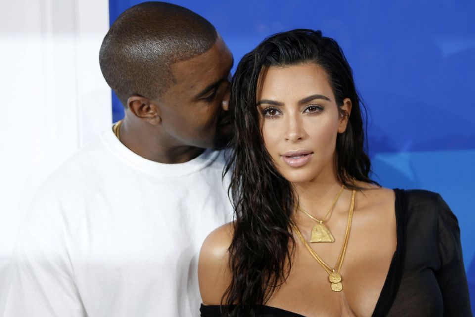Kanye West and Kim Kardashian arrive to Louis Vuitton Fall/Winter 2015-2016  Ready-To-Wear