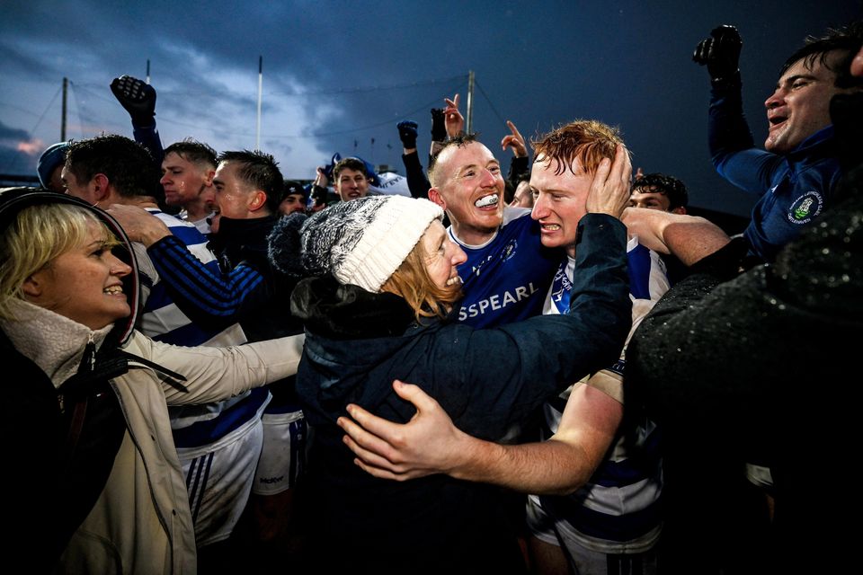 Damien Cahalane of Castlehaven (third from right) celebrates with his mother Ailish and brother Jack after the Munster Club SFRC final against Dingle at TUS Gaelic Grounds in Limerick. Photo: Brendan Moran/Sportsfile