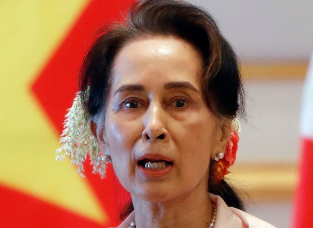 Myanmar cuts ex-leader Aung San Suu Kyi’s sentence and frees former president Win Myint