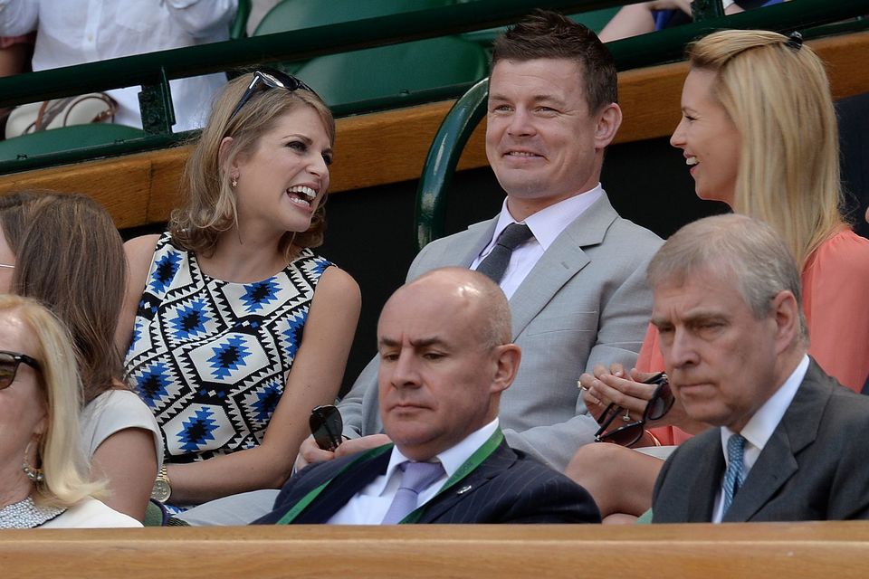 Brian O'Driscoll and his wife Amy Huberman (left) in the Royal Box during day twelve of the Wimbledon Championships at the All England Lawn Tennis and Croquet Club
