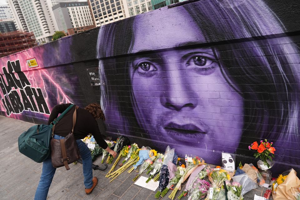 Floral tributes left by the Sabbath Wall on Navigation Street in Birmingham, following the death of Black Sabbath frontman Ozzy Osbourne (Jacob King/PA)