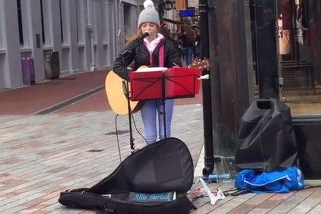 WATCH: This 11-year-old busker from Cork will give you chills with her  Adele cover | Irish Independent