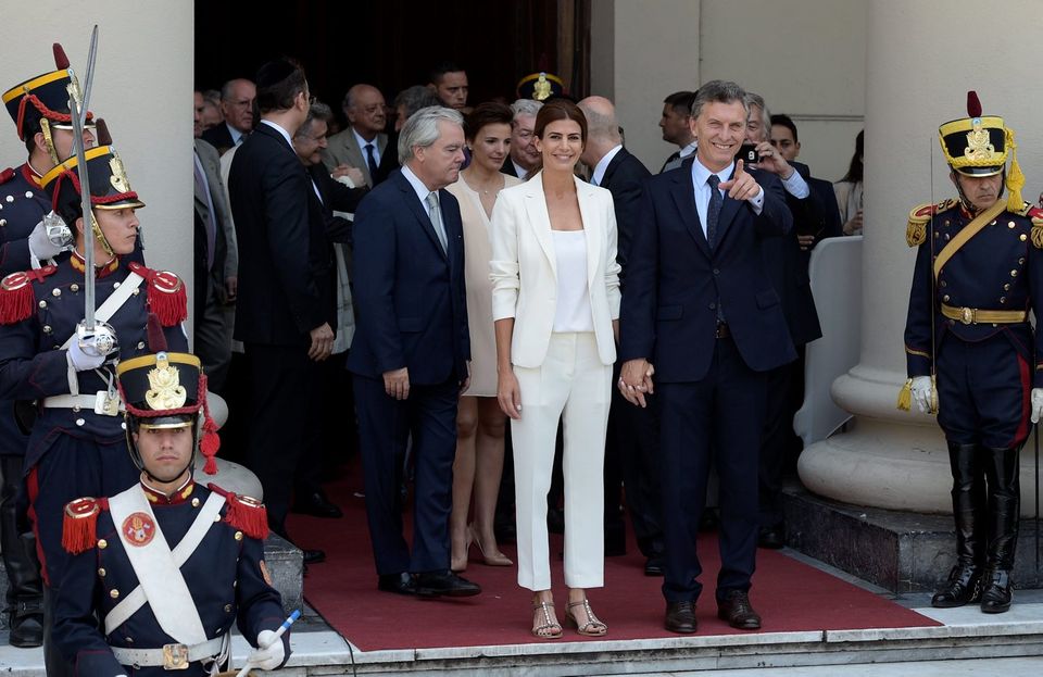 Argentina's President Mauricio Macri (R) and his wife first lady Juliana Awada leave at the end of a Te Deum at the Metropolitan Cathedral in Buenos Aires