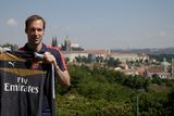 thumbnail: Czech Republic's goalkeeper Petr Cech presents his new Arsenal jersey after a press conference in Prague