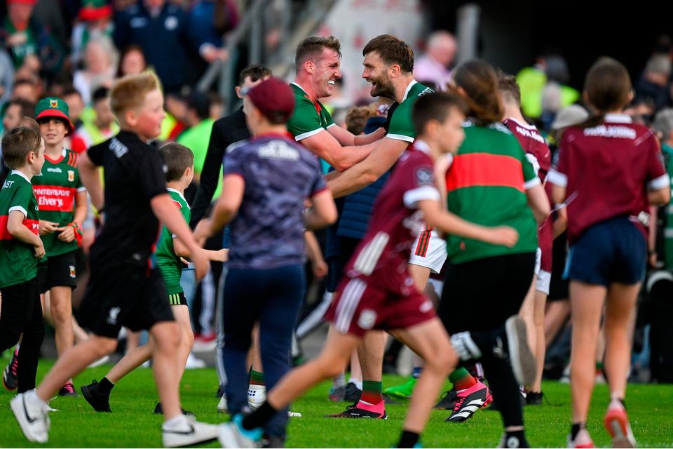 Eoghan McLaughlin (left) and Aidan O'Shea of Mayo celebrate after the All-Ireland SFC preliminary quarter-final win over Galway at Pearse Stadium. Photo: Brendan Moran/Sportsfile