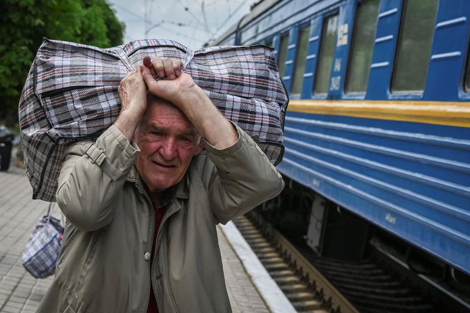 A man in Pokrovsk boards a train to Lviv during an evacuation from war-affected areas of eastern Ukraine. Photo: Reuters