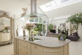 thumbnail: The kitchen end of the open-plan extension with folding doors to the sun terrace