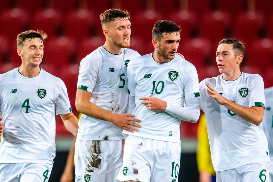 Troy Parrott, centre, celebrates his equalising goal with his U21 team-mates during the European U21 Championship Group 1 qualifier win over Sweden in Hansa City, Kalmar, Sweden. Photo: Suvad Mrkonjic/Sportsfile