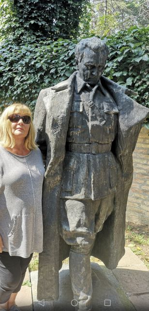 Eleanor with a statue of Tito in Belgrade