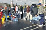 thumbnail: Residents queue for drinking water in Cork city