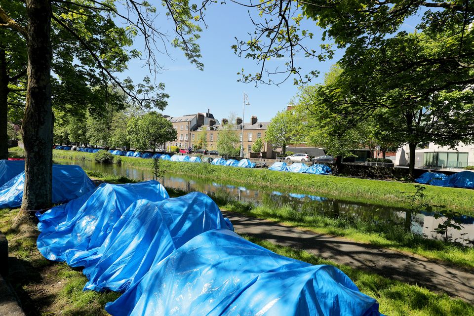 Tents set up on the banks of the Grand Canal in Dublin by men seeking international protection  Photo: Gerry Mooney