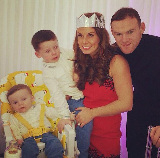 Wayne Rooney  with wife Coleen and their sons Kai and Klay.