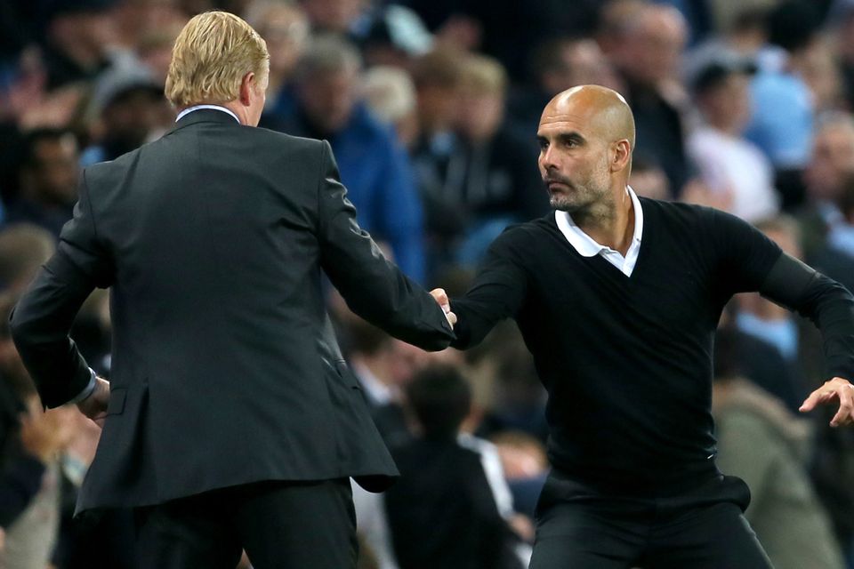 Ronald Koeman, left, and Pep Guardiola, right, had to settle for a point each