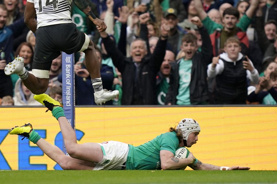 Ireland’s Mack Hansen dives over for a try in the 35-17 win over Fiji (Niall Carson/PA Images).