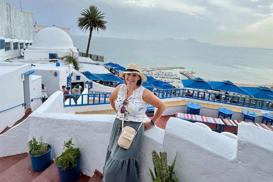 Sinéad Kennedy at Tunisia's Sidi Bou Said, known for its cobbled streets and blue-and-white houses