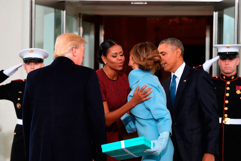 US President Barack Obama(R) and First Lady Michelle Obama(2nd-L) welcome Preisdent-elect Donald Trump(L) and his wife Melania(2nd-R) to the White House