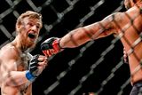 thumbnail: Conor McGregor taunts Chad Mendes during their Interim UFC Featherweight Championship Title bout at UFC 189. MGM Grand Garden Arena, Las Vegas, USA. Photo: Esther Lin / Sportsfile