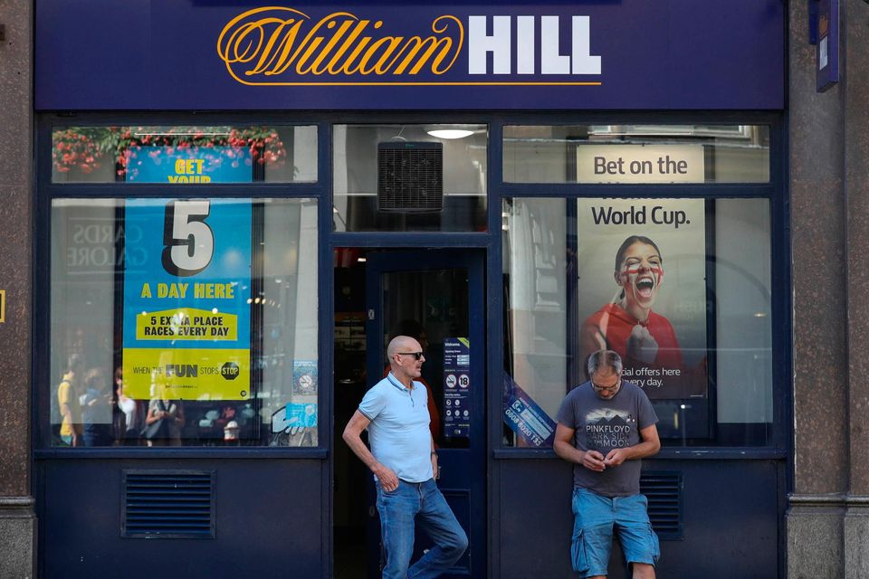 Britain's Gambling Commission has slapped a £19.2 million pound fine on companies owned by betting shop group William Hil