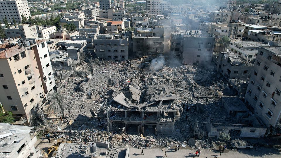 A view shows the site of Israeli strikes on houses in the central Gaza Strip October 18, 2023. REUTERS/Mohammed Fayq Abu Mostafa