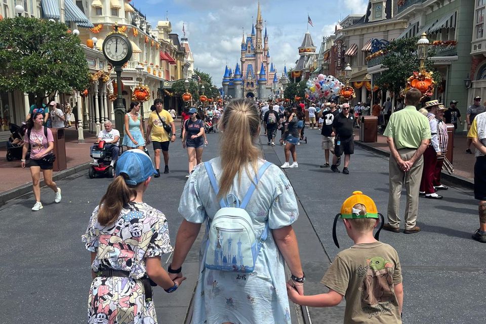 Disney expert Laura Shamel, with her children Mia (11) and Cameron (7) during a visit to one of the theme parks
