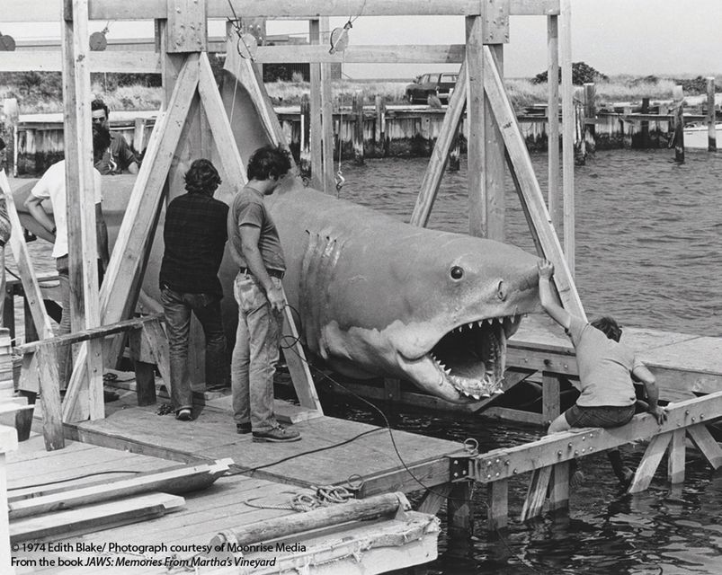 The mechanical shark is lowered into the water ahead of a scene in June, 1974. Photo: Reuters