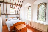 thumbnail: One of the four bedrooms in the property. 